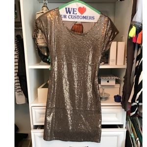 Sequin mini dress with open back